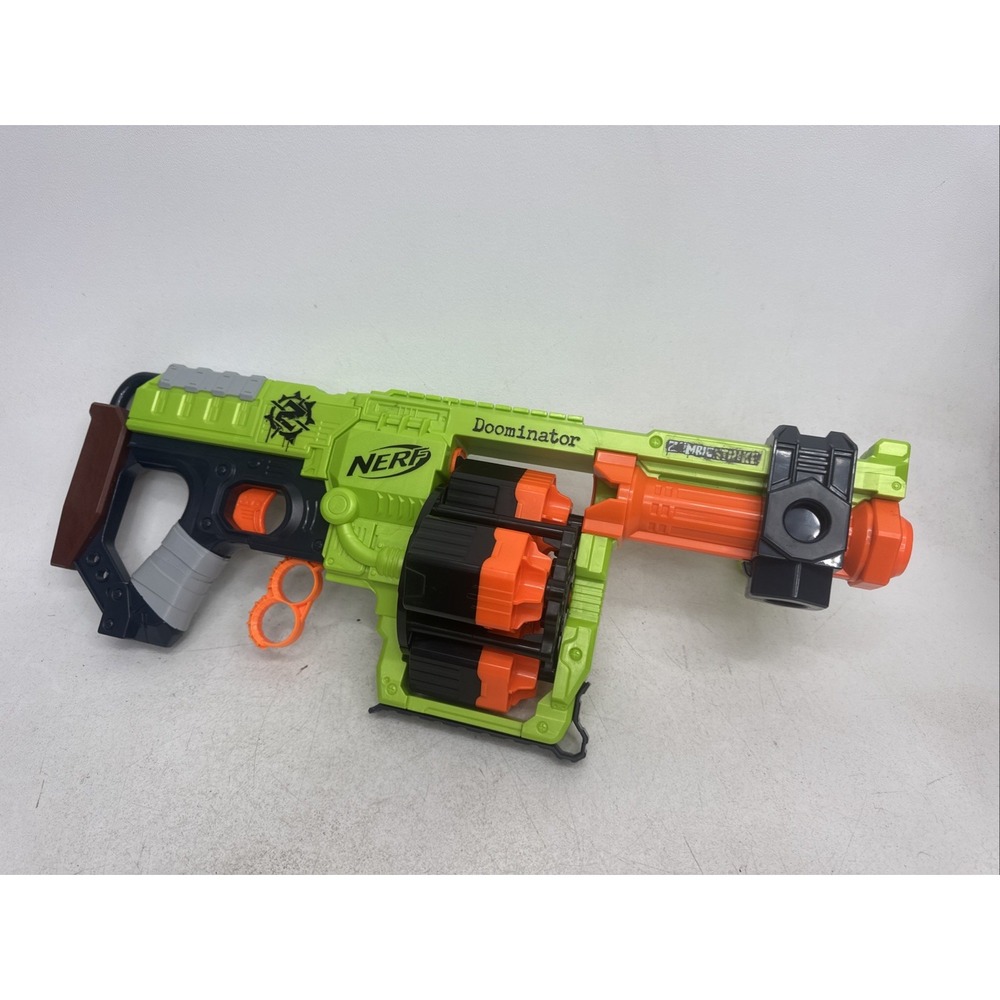 PRE-OWNED Nerf Zombie Strike Doominator 24 Dart Rotating Revolver Pump Working